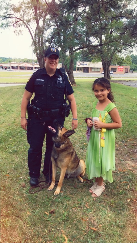 Ava and TJ with Middletown K-9 officer